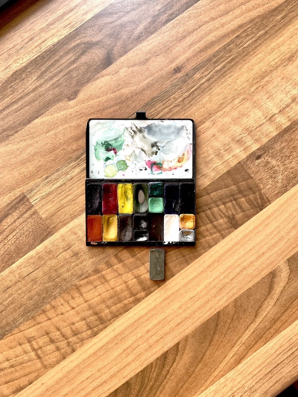 Small ArtToolKit palette, this time in black but with more miniature art supply stickers on it to decorate by Samantha Dion Baker.