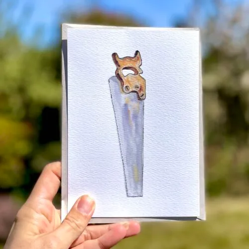 Watercolour wood saw on A5 greetings card