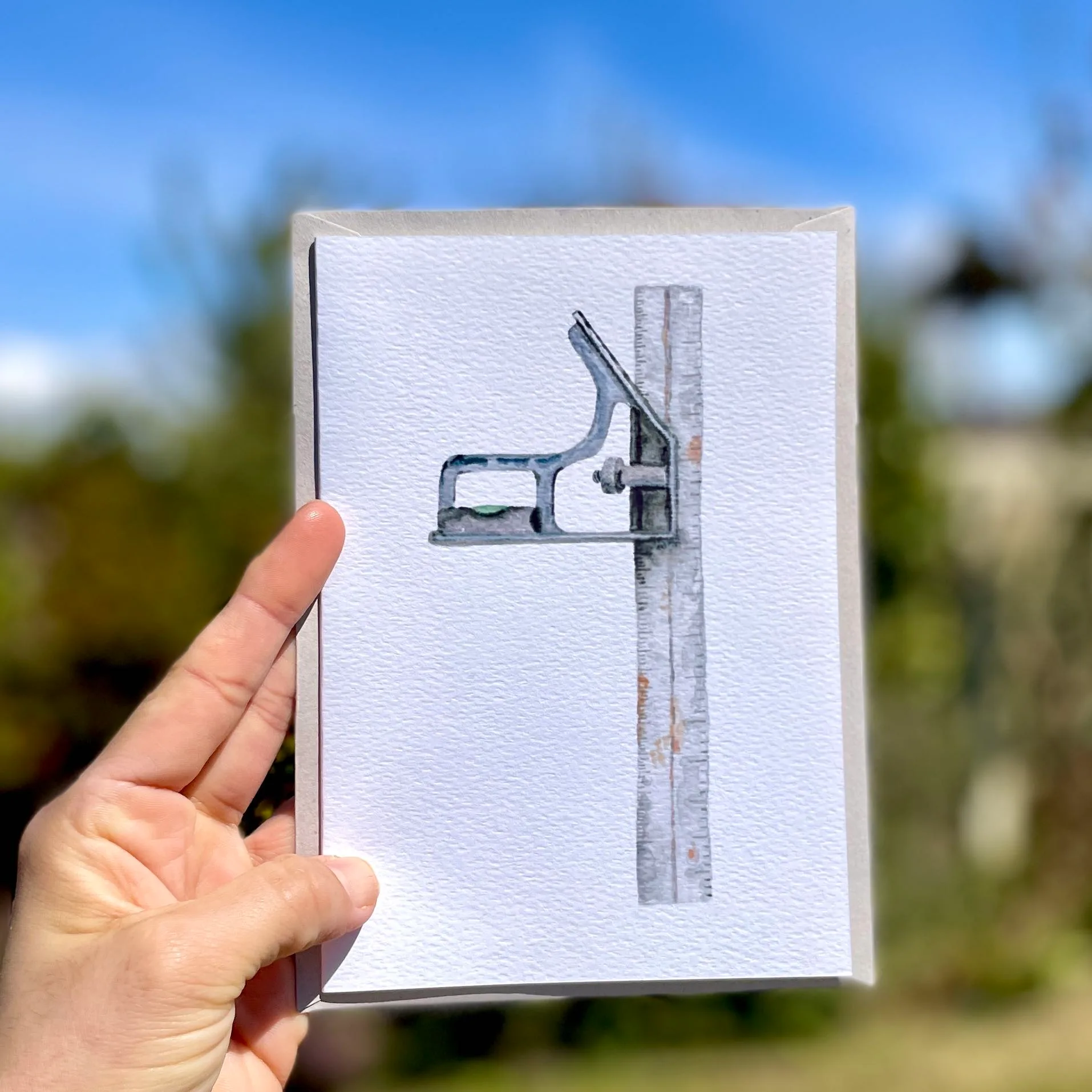 Watercolour carpenters square on an A5 greetings card b