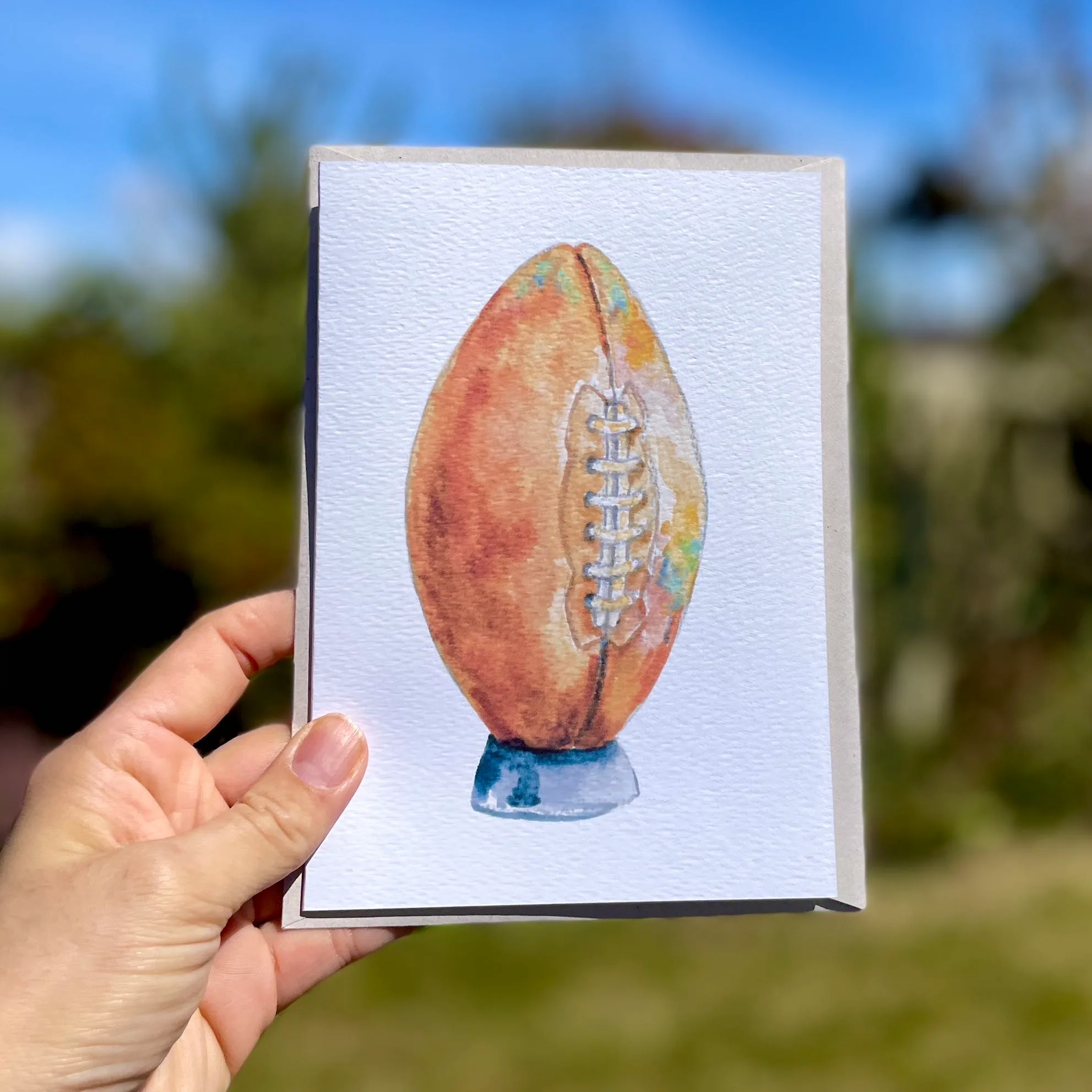 Watercolour rugby ball on an A5 greetings card