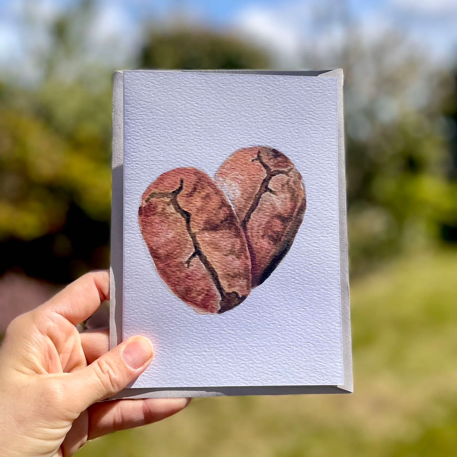 Watercolour coffee beans on an A5 greetings card