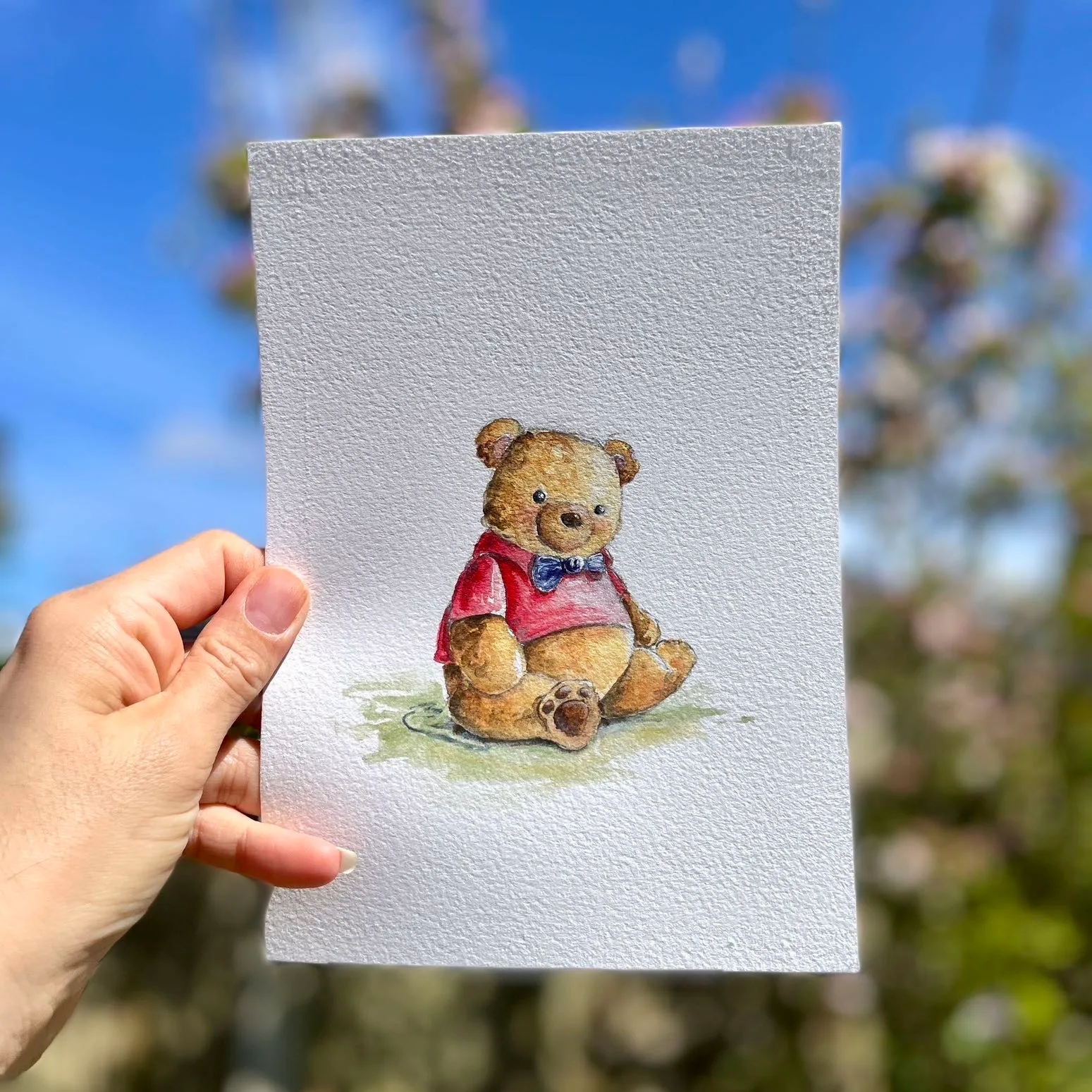 Original watercolour painting of a teddy bear wearing a red shirt and blue bowtie